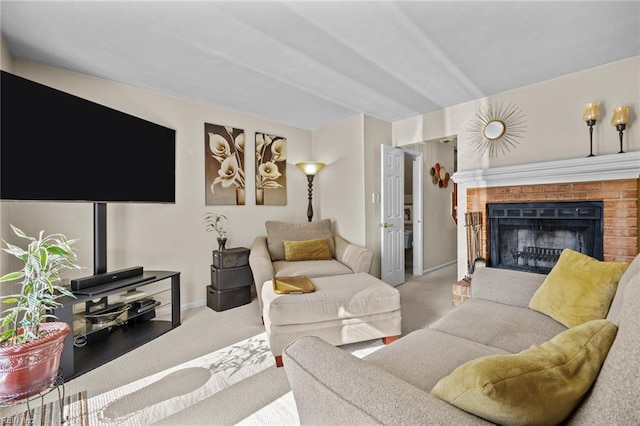 living room with carpet floors and a fireplace