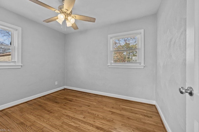 spare room featuring ceiling fan and light hardwood / wood-style floors