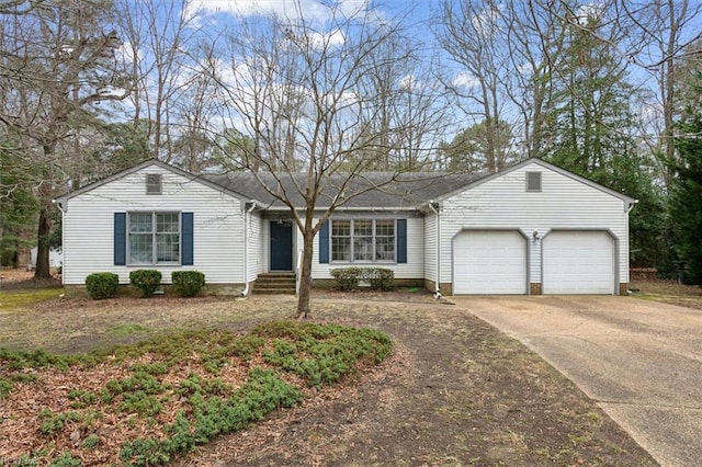 ranch-style home featuring a garage