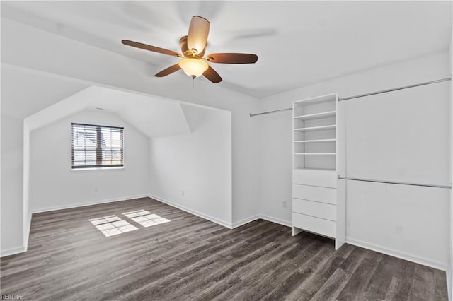 additional living space with dark wood-type flooring, ceiling fan, and lofted ceiling