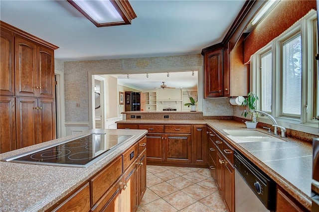 kitchen featuring sink, ceiling fan, light tile patterned flooring, black electric cooktop, and stainless steel dishwasher