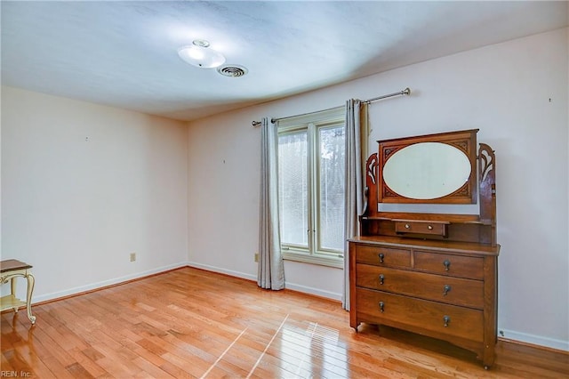 bedroom with light hardwood / wood-style flooring