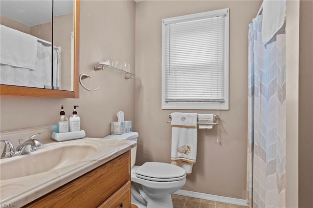 bathroom featuring vanity, tile patterned flooring, toilet, and a shower with shower curtain