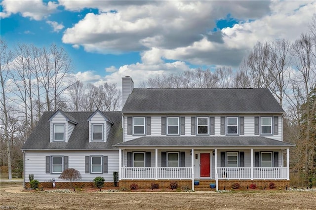 view of front of property with a front lawn and a porch