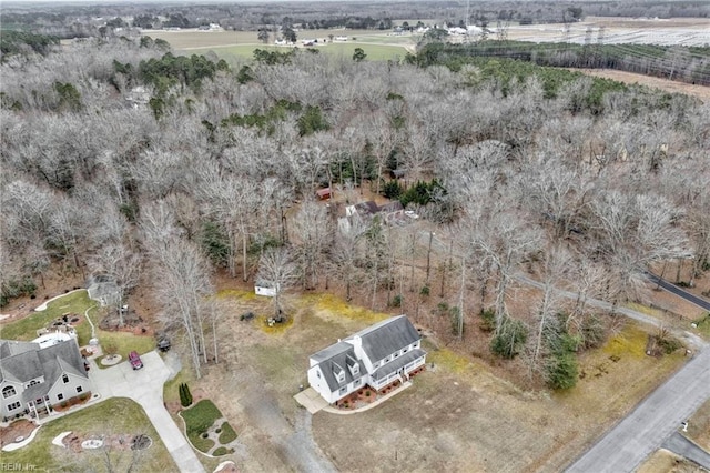 birds eye view of property with a rural view