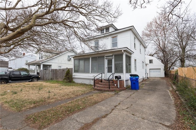 view of front of home with a garage and a front lawn