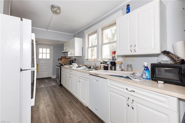 kitchen featuring white cabinetry and white appliances