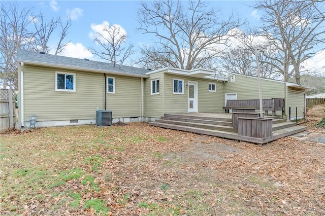 rear view of house featuring central AC unit and a deck