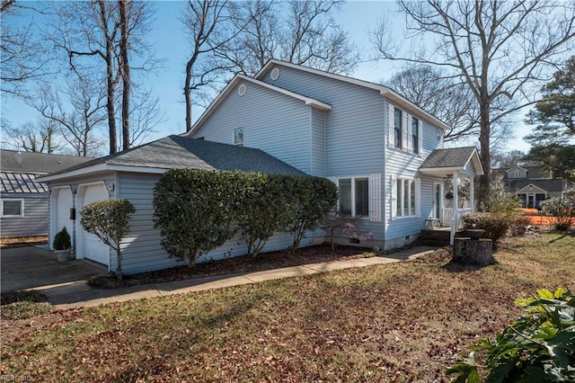 view of property exterior featuring a garage