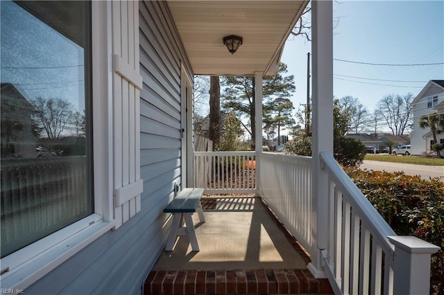 balcony featuring a porch