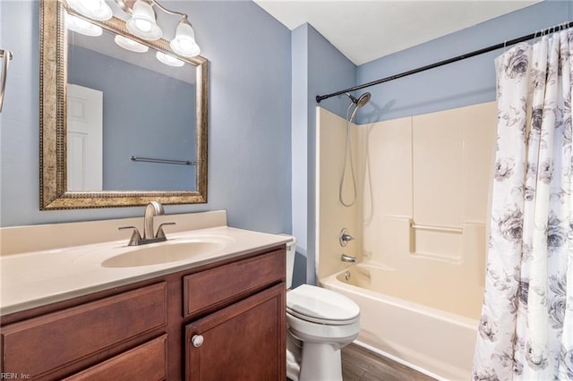 full bathroom featuring vanity, wood-type flooring, toilet, and shower / bath combo