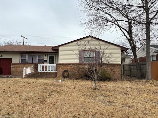 exterior space featuring a front lawn