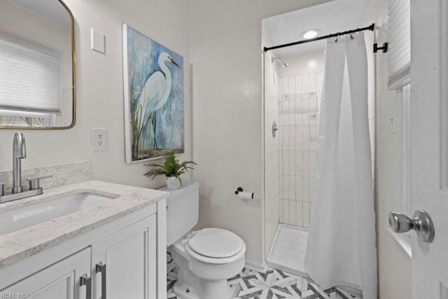 bathroom with vanity, a shower with curtain, and toilet