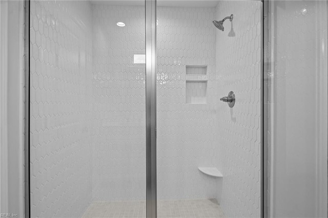 room details with a tile shower