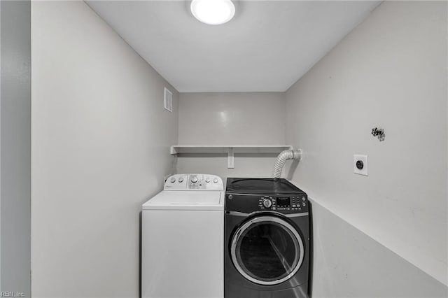 laundry area featuring washer and dryer