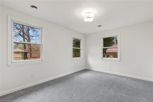 view of carpeted spare room