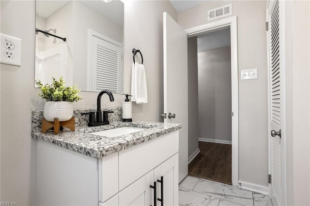 bathroom featuring vanity