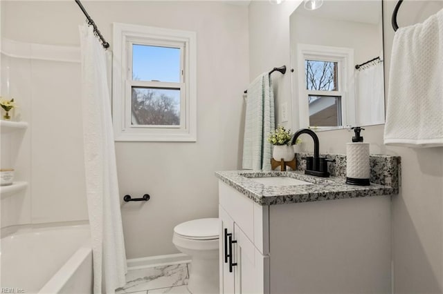 full bathroom with vanity, shower / tub combo, a wealth of natural light, and toilet