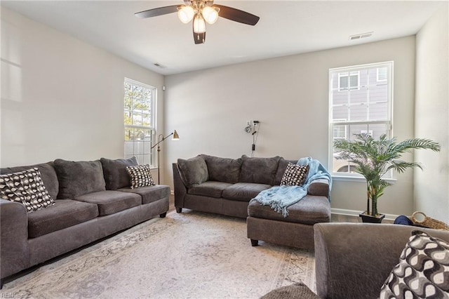 living room featuring ceiling fan