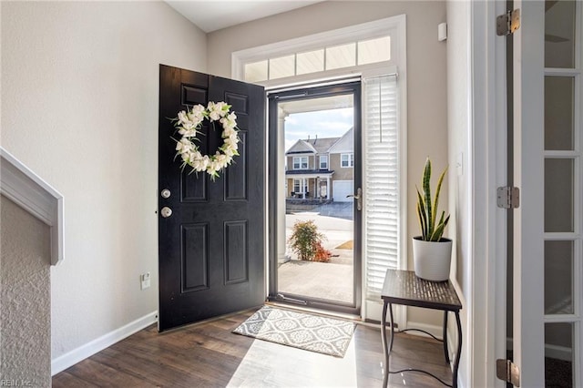 entrance foyer with dark hardwood / wood-style flooring