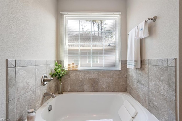 bathroom with a bathing tub