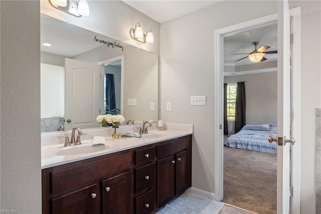 bathroom featuring vanity and ceiling fan