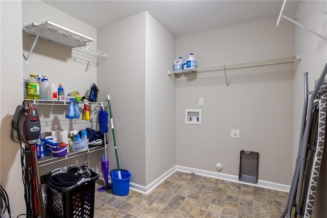 washroom with gas dryer hookup, electric dryer hookup, and washer hookup