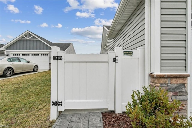 view of side of home with a yard