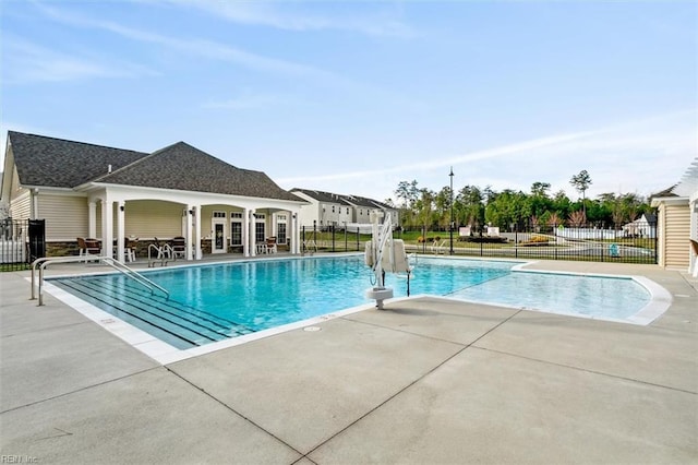 view of swimming pool with a patio