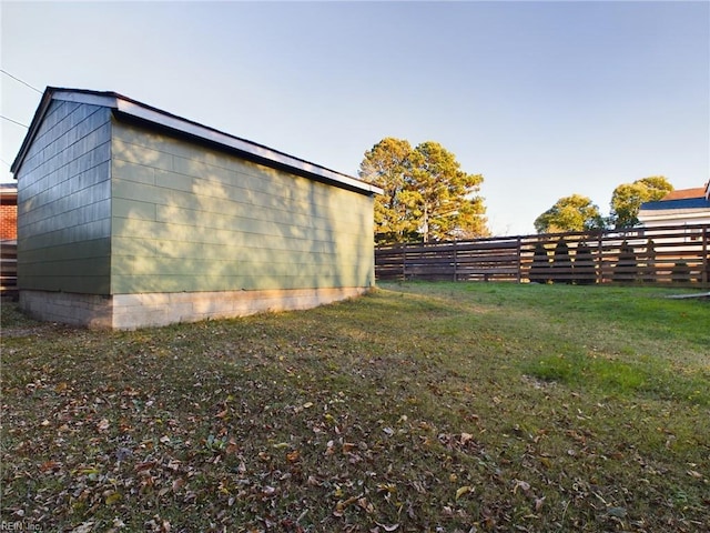 view of property exterior with a yard