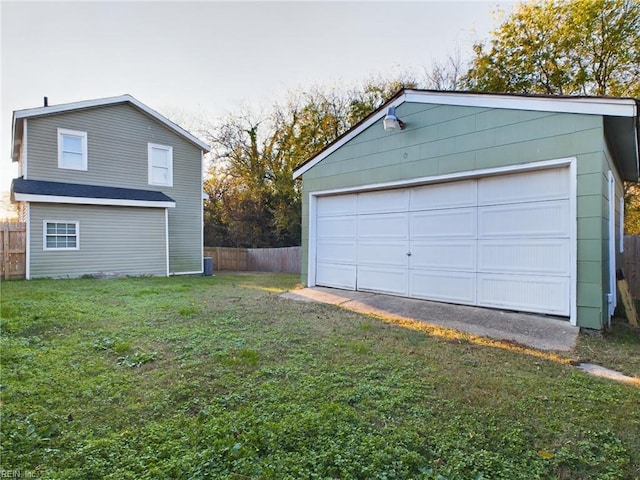 garage featuring a yard