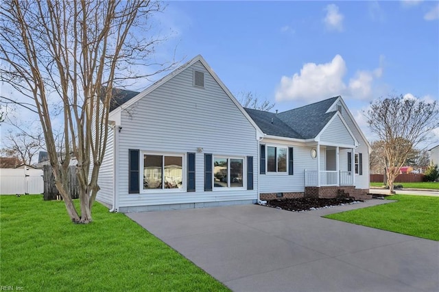 exterior space with a porch and a front yard