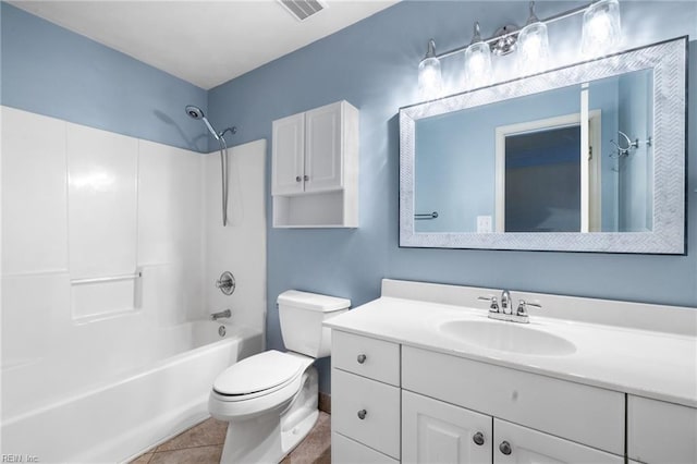 full bathroom featuring washtub / shower combination, tile patterned floors, toilet, and vanity