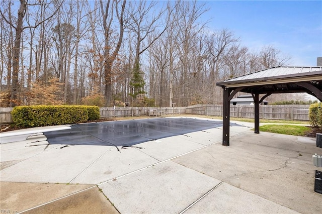 view of pool featuring a gazebo and a patio