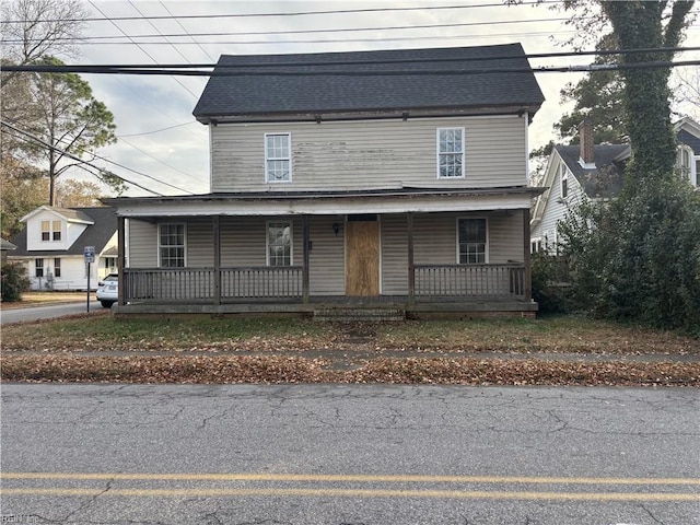 view of property with a porch