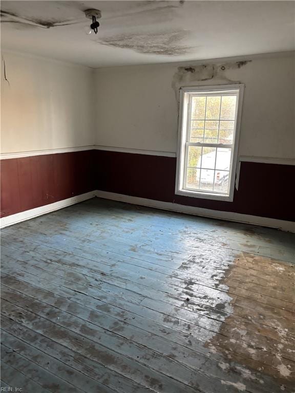 empty room featuring hardwood / wood-style floors