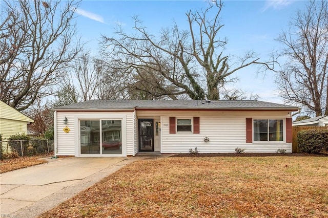 ranch-style house with a front yard