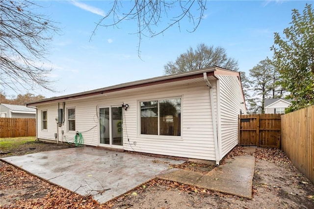 rear view of house featuring a patio area