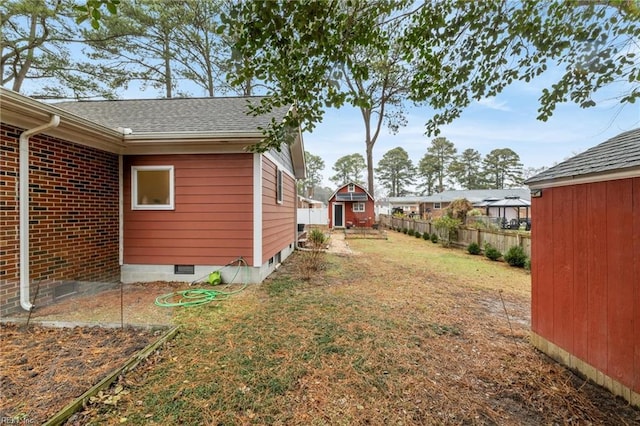 view of yard with a storage shed