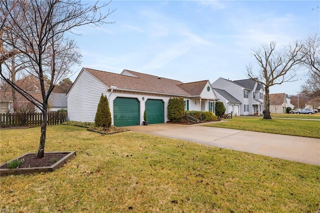 view of front of house with a garage and a front yard