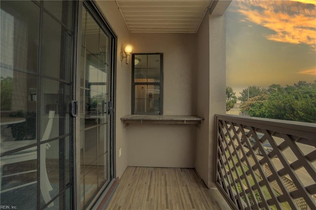 view of balcony at dusk