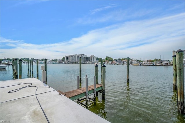 view of dock with a water view