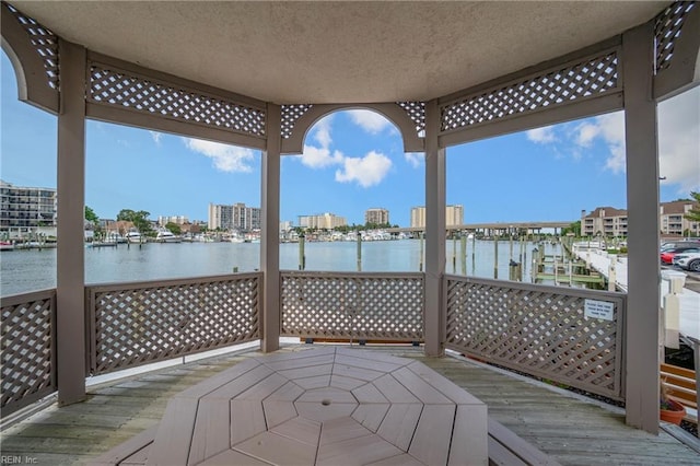 deck featuring a water view