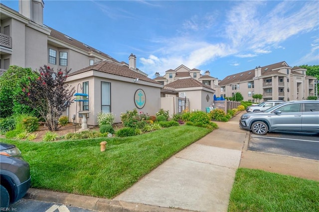 view of front of property with a front yard