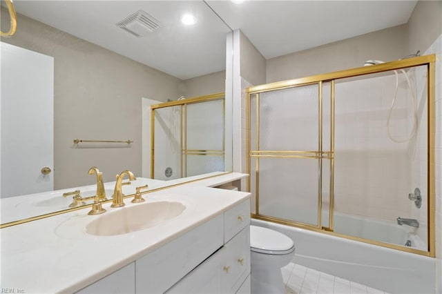 full bathroom with vanity, toilet, and combined bath / shower with glass door