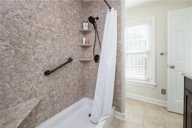 bathroom featuring vanity, a wealth of natural light, and a shower with curtain