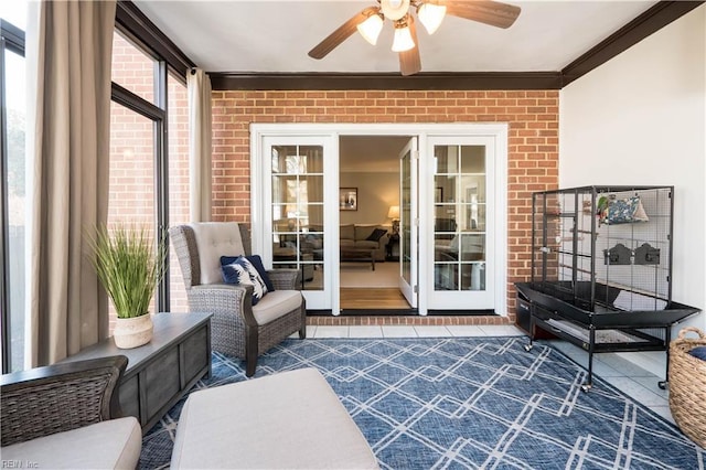 sunroom / solarium with ceiling fan