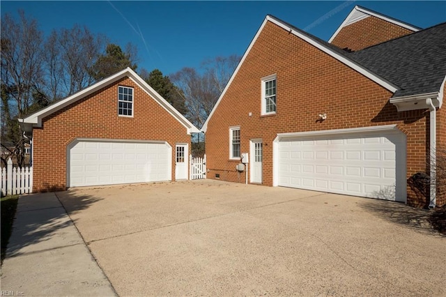 exterior space with a garage