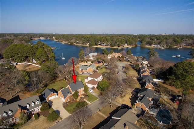 drone / aerial view with a water view