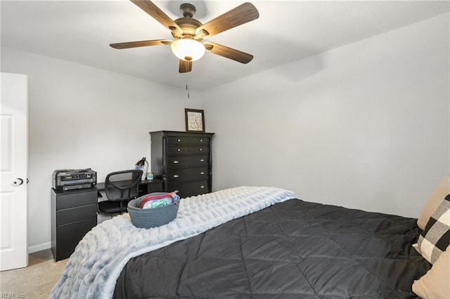 bedroom featuring ceiling fan and carpet flooring